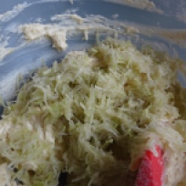 7. Mix in the grated bottle gourd